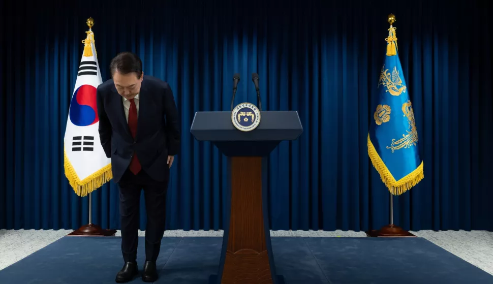 epa11761475 A handout photo made available by the South Korean Presidential Office shows President Yoon Suk Yeol bowing during his address to the nation at the Presidential office in Seoul, South Korea, 07 December 2024. Yoon Suk Yeol apologised to the nation in a short televised address ahead of a vote on his impeachment in the National Assembly on 07 December. He faces an impeachment motion from opposition lawmakers after he declared and then reversed martial law, citing the need to root out pro-North Korean forces and uphold the constitutional order. EPA/South Korean Presidential Office HANDOUT EDITORIAL USE ONLY/NO SALES