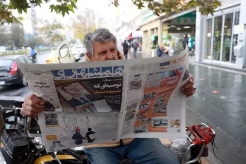 epa11766057 An Iranian man reads an Iranian newspaper reporting about former Syrian President Bashar al-Assad's fall, in Tehran, Iran, 09 December 2024. The Iranian Foreign Ministry said in a statement that 'Determining Syria's future and making decisions about its destiny are solely the responsibility of the Syrian people, without any destructive interference or external imposition'. Syrian rebels entered Damascus on 08 December 2024 and announced in a televised statement the 'Liberation of the city of Damascus and the overthrow of Bashar al-Assad', as well as the release of all the prisoners. EPA/ABEDIN TAHERKENAREH