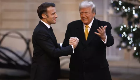 epa11762361 French President Emmanuel Macron (L) welcomes US president-elect Donald J. Trump at Elysee Palace prior the reopening ceremony of the Notre Dame de Paris Cathedral, in Paris, France, 07 December 2024. The Notre-Dame de Paris Cathedral reopens on 07 December after nearly six years of renovation work following its destruction by a fire on 15 April 2019. EPA/MOHAMMED BADRA