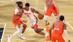 epa11778007 Houston Rockets forward Jabari Smith Jr. (10) guards the ball from Oklahoma City Thunder guard Isaiah Joe (L) during the fist half of an NBA Cup semi-final game against the Oklahoma City Tunder in Las Vegas, Nevada, USA, 14 December 2024. EPA/RONDA CHURCHILL SHUTTERSTOCK OUT