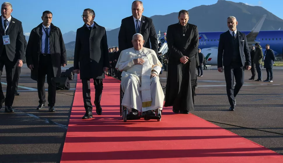 epa11778093 Pope Francis arrives at Ajaccio airport, Corsica island, France, 15 December 2024. During his first papal visit to Corsica, Pope Francis will attend a Conference on Popular Religiosity in the Mediterranean, meet with the clergy and religious of the island, and preside over Holy Mass. EPA/ETTORE FERRARI