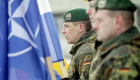 epa05776009 Soldiers partake in a welcoming ceremony for the first troops of the NATO enhanced Forward Presence (eFP) battalion group at the Rukla base in Rukla, Lithuania, 07 February 2017. NATO decided to station a multinational battalion in each of the three Baltic countries in response to Russia's intervention in Ukraine and military activity in the region. EPA/VALDA KALNINA