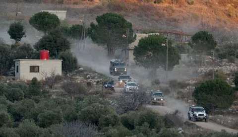 epa11776772 Israeli troops on the Syrian side of the border, between Israel and Syria, near the Druze village of Majdal Shams, in the Israeli-annexed Golan Heights, 14 December 2024. Israel's military said that paratroopers' forces, joined by other troops, are conducting 'defense activities' to prevent 'any threat' and are deployed in key positions within the buffer zone. EPA/ATEF SAFADI