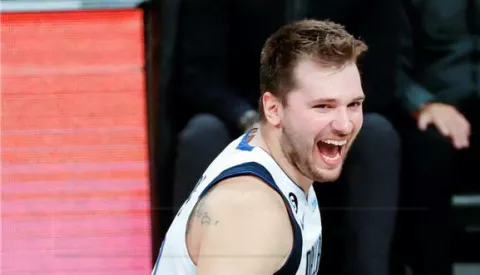 epaselect USA BASKETBALL NBAepaselect epa10270523 Dallas Mavericks guard Luka Doncic reacts during over-time in the NBA basketball game between the Dallas Mavericks and the Brooklyn Nets at Barclays Center in Brooklyn, New York, USA, 27 October 2022. EPA/JASON SZENES SHUTTERSTOCK OUT