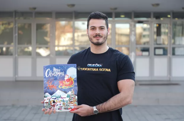 Student časti obrokom u menzi i &scaron;iri blagdanski duh