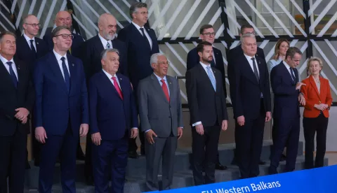 epa11784266 (L-R front row) Romania's President Klaus Werner Iohannis, Serbian President Aleksandar Vucic, Hungarian Prime Minister Viktor Orban, European Council President Antonio Costa, President of Montenegro Jakov Milatovic, President of the Republic of Lithuania Gitanas Nauseda, Greece's Prime Minister Kyriakos Mitsotakis and European Commission President Ursula von der Leyen pose for a family photo at the EU-Western Balkans Summit in Brussels, Belgium, 18 December 2024. EU and Western Balkans leaders are meeting in Brussels to discuss strengthening regional cooperation and partnerships. EPA/OLIVIER HOSLET