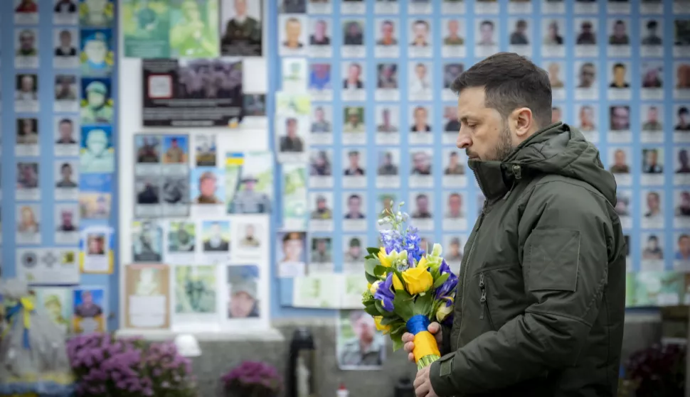 epa11760346 A handout photo made available by the Ukrainian Presidential Press Service shows Ukraine's President Volodymyr Zelensky laying flowers to the Memory Wall of the Fallen Defenders of Ukraine on the Day of the Armed Forces of Ukraine in Kyiv, Ukraine, 06 December 2024, amid the Russian invasion. Ukraine celebrates the Day of the Armed Forces every year on 06 December. EPA/UKRAINIAN PRESIDENTIAL PRESS SERVICE HANDOUT -- MANDATORY CREDIT: UKRAINIAN PRESIDENTIAL PRESS SERVICE -- HANDOUT EDITORIAL USE ONLY/NO SALES