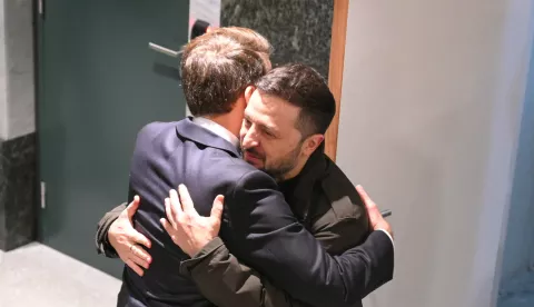 epa11784298 France's President Emmanuel Macron (L) hugs Ukraine's President Volodymyr Zelensky before a meeting at the European Council in Brussels, Belgium, 18 December 2024, on the sideline of EU and Western Balkans leaders meeting in Brussels to discuss strengthening regional cooperation and partnerships. EPA/NICOLAS TUCAT/POOL