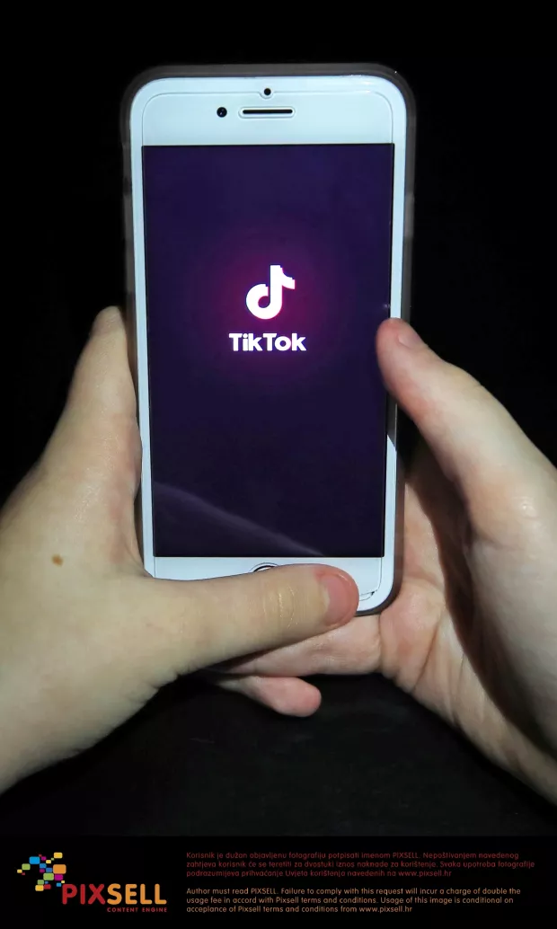 TikTok planning London headquarters File photo dated 27/12/19 showing the TikTok app on a smartphone. TikTok is planning to open a headquarters in London, according to reports, as the social media app continues to try and distance itself from China. Peter Byrne Photo: PA Images/PIXSELL