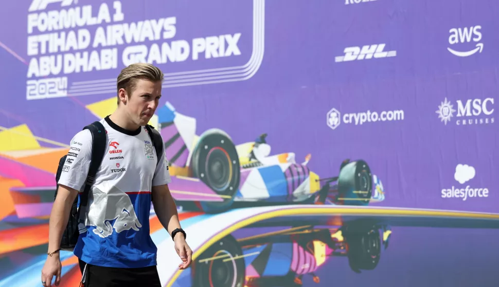 epa11758110 RB driver Liam Lawson of New Zealand arrives at the paddock ahead of the Formula One Abu Dhabi Grand Prix, in Abu Dhabi, United Arab Emirates, 05 December 2024. The 2024 Formula One Abu Dhabi Grand Prix will be held on the Yas Marina Circuit racetrack on 08 December. EPA/ALI HAIDER