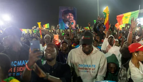 epa11237919 Supporters of opposition presidential candidate Bassirou Diomaye Faye and firebrand opposition leader Ousmane Sonko attend their closing campaign rally in Mbour, Senegal, 22 March 2024. Sonko of the dissolved party PASTEF (African Patriots of Senegal for Work, Ethics and Fraternity), and Faye, who is running for president in his place, were both released from prison late 14 March 2024. More than 7 million Senegalese registered to cast their vote for the presidential elections of 24 March. EPA/JEROME FAVRE