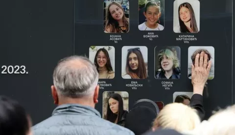 epa11315692 People pay tribute to the victims of the shooting at 'Vladislav Ribnikar' elementary school in Belgrade, Serbia, 03 May 2024. On 03 May 2023, a teenage student fatally shot nine students and a school guard using two handguns, which he had taken from his father. Six others, five students and a teacher, also sustained injuries in the attack. EPA/ANDREJ CUKIC