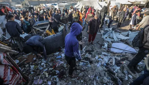 epa11778134 Internally displaced Palestinians inspect destroyed tents inside Al Dura stadium following an Israeli air strike in the west of Deir al-Balah town, central Gaza Strip, 15 December 2024. The Palestinian Ministry of Health in Gaza reported that at least 22 people were killed on December 14 during Israeli airstrikes on the central Gaza Strip. According to the UN, at least 1.9 million people (or nine in ten people) in the Gaza Strip are internally displaced, including people who have been repeatedly displaced. Since October 2023, only about 11 percent of the Gaza Strip has not been placed under Israeli-issued evacuation orders, the UN aid coordination office OCHA said. EPA/MOHAMMED SABER