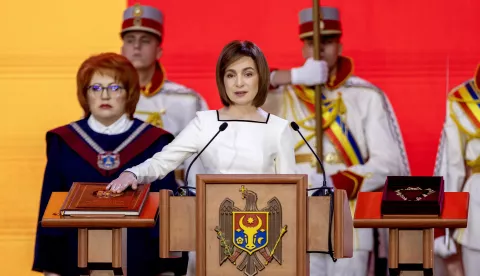 epa11792018 Moldovan President Maia Sandu takes the oath on the Moldova's Constitution during her inauguration ceremony at the Republican Palace in Chisinau, Moldova, 24 December 2024. Sandu took the oath of office for a second term after winning the runoff of the presidential elections held in Moldova on 03 November. EPA/DUMITRU DORU