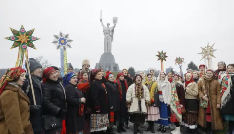 epa11789473 Ukrainians wear traditional attire and sing Christmas carols near the Motherland Monument in Kyiv, Ukraine, 22 December 2024, amid the Russian invasion. Ukraine will celebrate Christmas on 25 December for the second time in accordance with the Western calendar. Ukrainian President Zelensky signed a law in July 2023 to move the official Christmas Day holiday to 25 December, departing from the Russian Orthodox Church tradition of celebrating on 07 January. Russian troops entered Ukraine on 24 February 2022 starting a conflict that has provoked destruction and a humanitarian crisis. EPA/SERGEY DOLZHENKO 72067