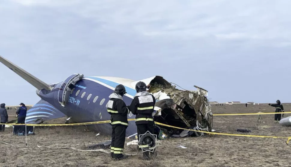 epa11792901 A handout photo made available by the press service of the Ministry for Emergency Situations of Kazakhstan shows emergency specialists working at the crash site of a passenger plane near Aktau, Kazakhstan, 25 December 2024. Azerbaijan Airlines Embraer ERJ-190AR passenger plane flying from Baku to Grozny crashed some three kilometres away from the city of Aktau. According to preliminary information, the incident was caused by a collision between the aircraft and a flock of birds. EPA/KAZAKHSTAN EMERGENCIES MINISTRY HANDOUT -- BEST QUALITY AVAILABLE -- MANDATORY CREDIT -- HANDOUT EDITORIAL USE ONLY/NO SALES