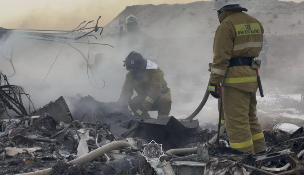 epa11792900 A handout photo made available by the press service of the Ministry for Emergency Situations of Kazakhstan shows emergency specialists working at the crash site of a passenger plane near Aktau, Kazakhstan, 25 December 2024. Azerbaijan Airlines Embraer ERJ-190AR passenger plane flying from Baku to Grozny crashed some three kilometres away from the city of Aktau. According to preliminary information, the incident was caused by a collision between the aircraft and a flock of birds. EPA/KAZAKHSTAN EMERGENCIES MINISTRY HANDOUT -- BEST QUALITY AVAILABLE -- MANDATORY CREDIT -- HANDOUT EDITORIAL USE ONLY/NO SALES