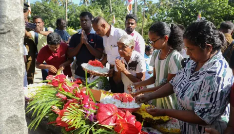 epa11793674 Sri Lankan tsunami survivors pay tribute to a tsunami monument during the 20th anniversary commemoration of 2004 tsunami victims in the Peraliya suburb of Galle, Sri Lanka, 26 December 2024. Sri Lanka commemorates the 20th anniversary of the 2004 Indian Ocean tsunami, which struck on December 26, 2004, triggered by a 9.2 magnitude earthquake in the Indian Ocean off the west coast of northern Sumatra, Indonesia. The tsunami claimed over 220,000 lives, internally displaced more than half a million people, and left hundreds of thousands without livelihoods, according to the United Nations, making it one of the deadliest natural disasters in history. Indonesia, Sri Lanka, India, the Maldives, and Thailand sustained massive damage from the catastrophe. EPA/CHAMILA KARUNARATHNE