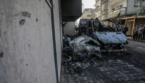 epa11793699 A destroyed vehicle near Al Awda hospital following an Israeli airstrike in Al Nuseirat refugee camp, central Gaza Strip, 26 December 2024. According to the Government Media Office (GMO) in Gaza, five journalists from the 'Al-Quds Today' TV satellite channel were killed after an overnight Israeli airstrike hit their vehicle in Al Nuseirat camp, central Gaza. More than 45,000 Palestinians and over 1,400 Israelis have been killed, according to the Palestinian Health Ministry and the Israeli Army, since Hamas militants launched an attack against Israel from the Gaza Strip on 07 October 2023, and the Israeli operations in Gaza and the West Bank which followed it. EPA/MOHAMMED SABER