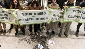 epa10267380 Climate activists gather in the lobby of the building where the investment company BlackRock has offices for a protest against the company's connection to the fossil fuel industry in New York, New York, USA, 26 October 2022. The group is holding a week of protests in the city to draw attention to the climate change crisis during the 10-year anniversary of Hurricane Sandy. EPA/JUSTIN LANE