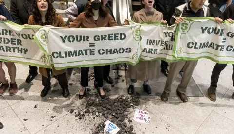 epa10267380 Climate activists gather in the lobby of the building where the investment company BlackRock has offices for a protest against the company's connection to the fossil fuel industry in New York, New York, USA, 26 October 2022. The group is holding a week of protests in the city to draw attention to the climate change crisis during the 10-year anniversary of Hurricane Sandy. EPA/JUSTIN LANE