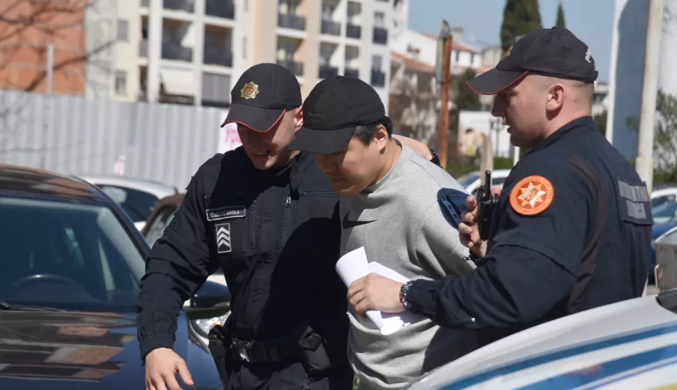 epa10540911 Police officers escort South Korean crypto mogul Do Kwon (C) in Podgorica, Montenegro, 24 March 2023. Do Kwon is wanted in South Korea, Singapore and the USA for the involvement in the collapse of his company Terraform, which is estimated to have cost investors more than 40 billion US dollars. EPA/BORIS PEJOVIC