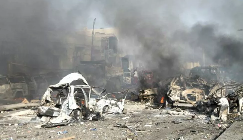 epa06279616 (FILE) - Destroyed vehciles are seen at the scene of a massive explosion in front of Safari Hotel in the capital Mogadishu, Somalia, 14 October 2017 (reissued 21 October 2017). According to media reports on 21 October 2017, government sources state that the death toll from the explosion, caused after a truck bomb went off on a busy street in central Mogadishu, has risen to 358 people. The blast is the deadliest attack in the country's history, and was blamed on al-Shahaab, an armed islamist group active in East Africa. EPA/SAID YUSUF WARSAME