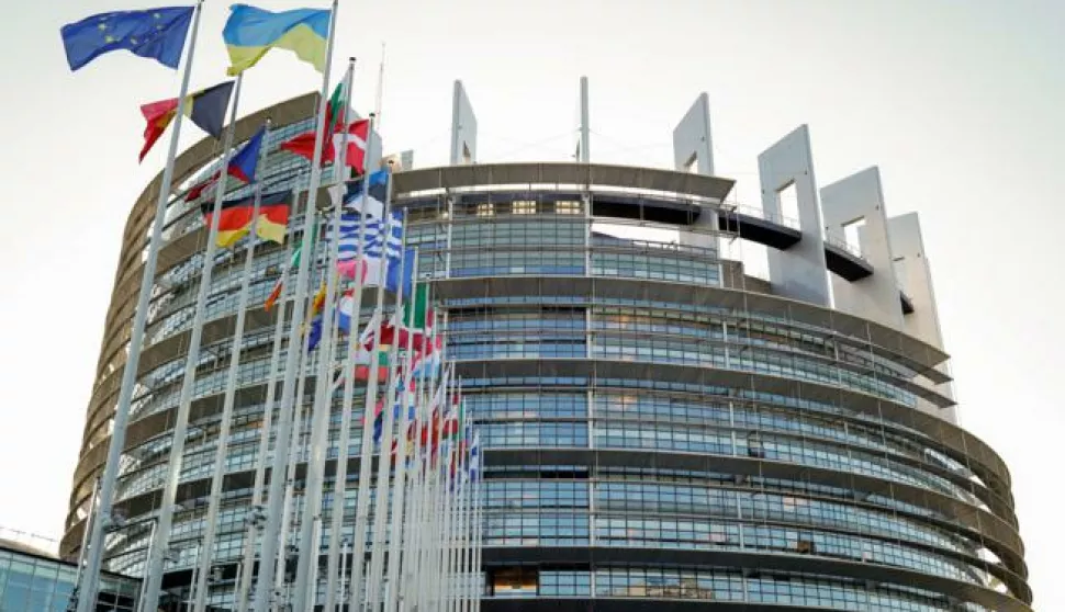 epa10321854 Flags in front of the European Parliament building in Strasbourg, France, 23 November 2022. EPA/JULIEN WARNAND