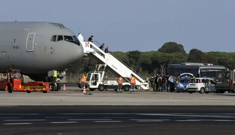 epa09433354 The last flight of the Italian Air Force from Kabul which transported Afghan civilians, the Italian consul Tommaso Claudi, the Italian ambassador Stefano Pontecorvo and the Carabinieri of Tuscaniaat Rome Leonardo Da Vinci Airport in Fiumicino, 28 August 2021. EPA/ANGELO CARCONI