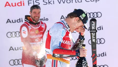 epa11797421 Second placed Vincent Kriechmayr (L) of Austria and winner Fredrik Moeller (R) celebrate on the podium after the Men's Super G race at the FIS Alpine Skiing World Cup stage in Bormio, Italy, 29 December 2024. EPA/SOLERO/BISI