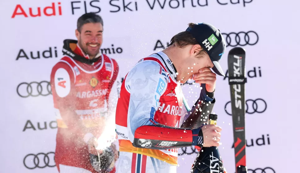 epa11797421 Second placed Vincent Kriechmayr (L) of Austria and winner Fredrik Moeller (R) celebrate on the podium after the Men's Super G race at the FIS Alpine Skiing World Cup stage in Bormio, Italy, 29 December 2024. EPA/SOLERO/BISI