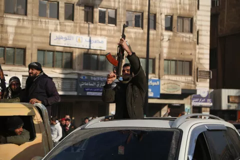 epa11765717 Syrian rebels celebrate following the takeover of Damascus, in Homs, Syria, 08 December 2024. Syrian rebels entered Damascus on 08 December 2024 and announced in a televised statement the 'Liberation of the city of Damascus and the overthrow of Bashar al-Assad', as well as the release of all the prisoners. The rebels also urged the Syrian armed forces to leave Syrian public institutions, which will stay under the control of the outgoing Syrian prime minister until the official handover ceremony. EPA/BILAL AL HAMMOUD