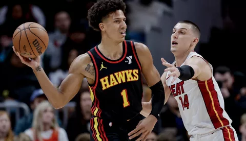 epa11796355 Atlanta Hawks forward Jalen Johnson (L) in action against Miami Heat guard Tyler Herro (R) during the first half of an NBA basketball game between the Miami Heat and the Atlanta Hawks in Atlanta, Georgia, USA, 28 December 2024. EPA/ERIK S. LESSER SHUTTERSTOCK OUT