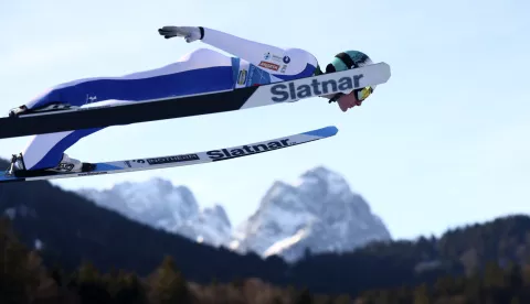 epa11801228 Domen Prevc of Slovenia is airborne during the Trial Round in the second stage of the 73rd Four Hills Ski Jumping Tournament in Garmisch-Partenkirchen, Germany, 01 January 2025. EPA/ANNA SZILAGYI