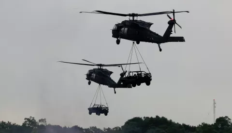 epa07079832 Taiwan black hawk helicopters maneuver during a military drill ahead of Taiwan's National day in Taoyuan, Taiwan, 09 October 2018. Paraguay President Mario Abdo Benitez is in Taiwan to attend the Taiwan National day on 10 October 2018, and to strengthen ties between two countries. EPA/RITCHIE B. TONGO