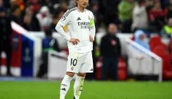 epa11744519 Luka Modric of Real Madrid looks on during the UEFA Champions League match between Liverpool and Real Madrid in Liverpool, Britain, 27 November 2024. EPA/PETER POWELL