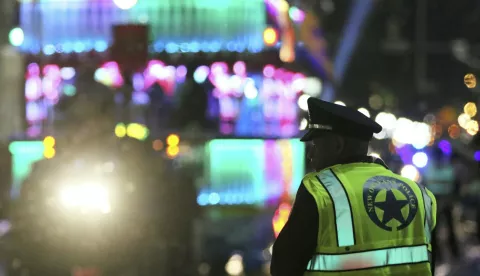 epa05815572 A member of the New Orleans Police Department (NOPD) works the parade route as the Krewe of Endymion Mardi Gras Parade rolls in New Orleans, Louisiana, USA, 25 February 2017. According to reports, dozens of people were injured after a pickup truck slammed into a crow in the Mid-City section of New Orleans during a parade on 25 February 2017. A man was taken into custody and police was said to investigate the suspect for driving while intoxicated, media added. New Orleans is celebrating Mardi Gras leading up to the last day of Carnival on Fat Tuesday. EPA/DAN ANDERSON