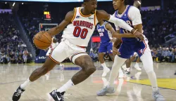 epa11803050 Golden State Warriors forward Jonathan Kuminga (L) and Philadelphia 76ers guard Jeff Dowtin Jr. in action during the frst half of an NBA game in San Francisco, California, USA, 02 January 2025. EPA/JOHN G. MABANGLO SHUTTERSTOCK OUT