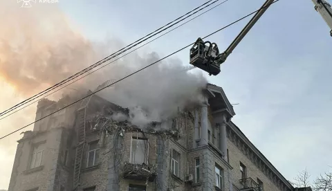 epa11800853 A handout photo made available by the State Emergency Service shows Ukrainian rescuers working at the site of a drone attack on a residential building in Kyiv, Ukraine, 01 January 2025, amid the ongoing Russian invasion. According to the State Emergency Service, at least three people were injured as a result of a Russian drone attack on Kyiv. EPA/STATE EMERGENCY SERVICE HANDOUT HANDOUT EDITORIAL USE ONLY/NO SALES