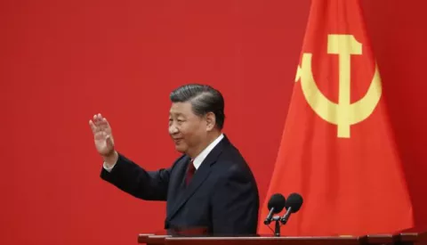 epaselect epa10260230 Chinese President Xi Jinping waves at a press conference introducing the new members of the Standing Committee of the Political Bureau of the 20th Chinese Communist Party (CPC) Central Committee at the Great Hall of People in Beijing, China, 23 October 2022. The members of the Politburo Standing Committee in China represent the collective supreme power of the Chinese Communist Party for the next five years. EPA/MARK R. CRISTINO