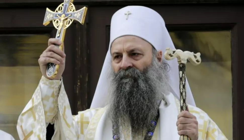 epa09023352 The new head of the Serbian Orthodox Church, Patriarch Porfirije gives blessings after a mass in Belgrade, Serbia, 19 February 2021. Serbian Orthodox Church enthroned its 46th leader after he was elected on 18 February 2021. EPA/ANDREJ CUKIC