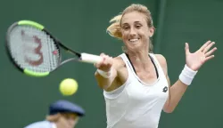 epa06065381 Petra Martic of Croatia in action against Daria Gavrilova of Australia during their first round match for the Wimbledon Championships at the All England Lawn Tennis Club, in London, Britain, 04 July 2017. EPA/GERRY PENNY EDITORIAL USE ONLY/NO COMMERCIAL SALES------3x color. sport