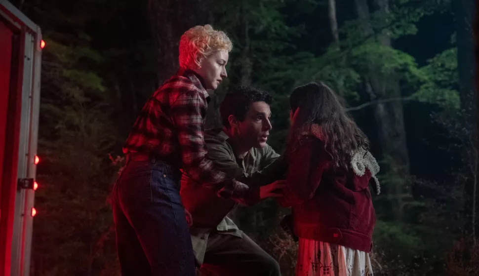 (from left) Charlotte (Julia Garner), Blake (Christopher Abbott) and Ginger (Matilda Firth) in Wolf Man, directed by Leigh Whannell.