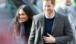 epa06521846 Britain's Prince Harry (R) and his fiancee Meghan Markle (L) during their visit to Social Bite cafe in Edinburgh, Britain, 13 February 2018. They are on their first official joint visit to Scotland. EPA/ROBERT PERRY