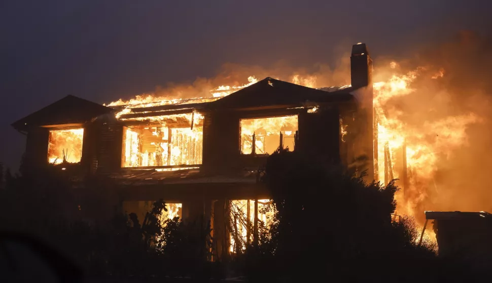 epa11813383 A house burns as a result of the Palisades wildfire in Pacific Palisades, California, USA, 08 January 2025. According to data from California Department of Forestry and Fire Protection, CAL FIRE, the Palisades fire is burning across nearly 3000 acres and has forced widespread thousands of evacuations in the Los Angeles area. EPA/CAROLINE BREHMAN