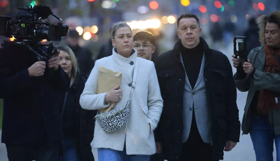 epa11784820 Caroline Darian (L), daughter of Gisele Pelicot, and her brother David (R) arrive at the criminal court where her father Dominique Pelicot is on trial in Avignon, South of France, 19 December 2024. Judges will hand down verdicts on 51 men in the mass rape trial in which Dominique Pelicot is accused of drugging and raping his then-wife, Gisele Pelicot, as well as inviting dozens of men to rape her while she was unconscious at their home in Mazan, France, between 2011 and 2020. EPA/GUILLAUME HORCAJUELO