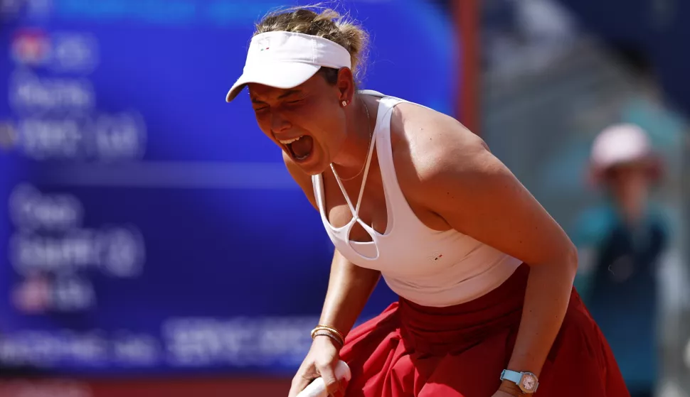 epa11508420 Donna Vekic of Croatia reacts during the Women's Singles third round match against Coco Gauff of the US at the Tennis competitions in the Paris 2024 Olympic Games, at the Roland Garros in Paris, France, 30 July 2024. EPA/RITCHIE B. TONGO