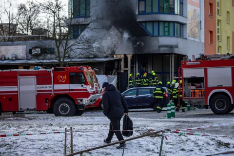 epa11819902 A man walks past the burnt restaurant damaged by a propane-butane cylinder explosion in Most, Czech Republic, 12 January 2025. According to the police, six people died, and another eight people are injured. EPA/MARTIN DIVISEK