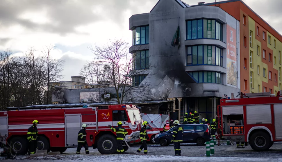 epa11819909 Firefighters and security forces check the scene of the burnt restaurant damaged by a propane-butane cylinder explosion in Most, Czech Republic, 12 January 2025. According to the police, six people died, and another eight people are injured. EPA/MARTIN DIVISEK