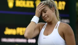 epa06862028 Jana Fett of Croatia reacts during her first round match against Daria Kasatkina of Russia during the Wimbledon Championships at the All England Lawn Tennis Club, in London, Britain, 03 July 2018. EPA/NEIL HALL EDITORIAL USE ONLY/NO COMMERCIAL SALES